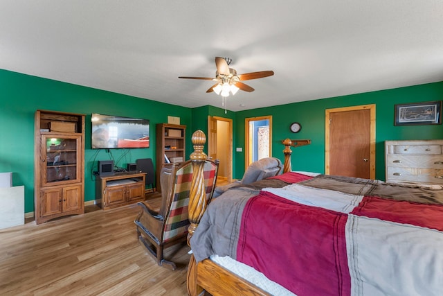 42118 Lowden Ave, Sunrise Twp, MN 55032 - bedroom with wood finished floors and ceiling fan