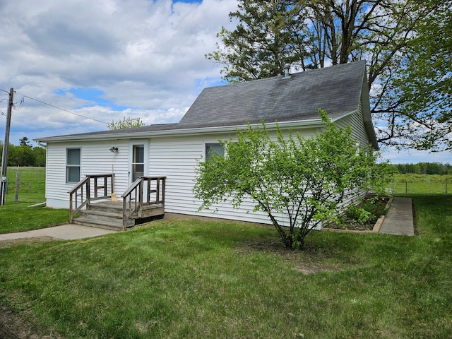 10244 State Highway 87, Blueberry Twp, MN 56464 - view of front of house featuring a front lawn and roof with shingles