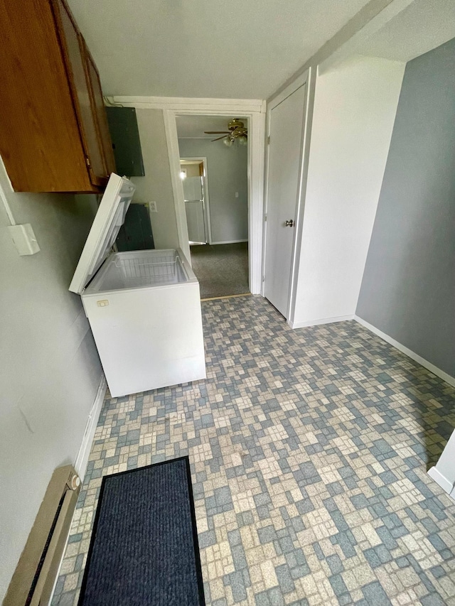 10244 State Highway 87, Blueberry Twp, MN 56464 - kitchen with a baseboard radiator and a ceiling fan