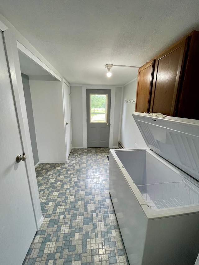 10244 State Highway 87, Blueberry Twp, MN 56464 - laundry area with cabinet space and baseboards