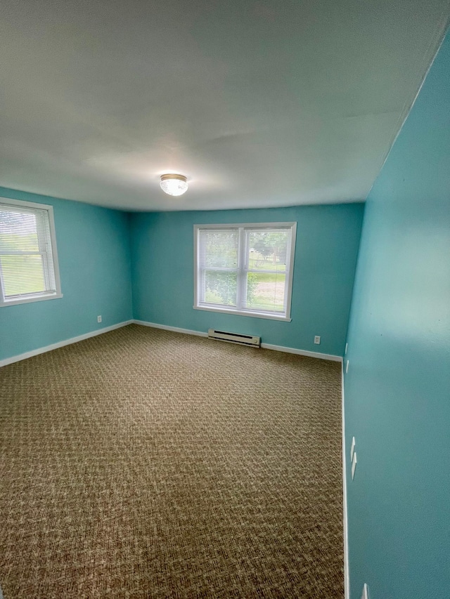 10244 State Highway 87, Blueberry Twp, MN 56464 - carpeted spare room with baseboard heating and baseboards