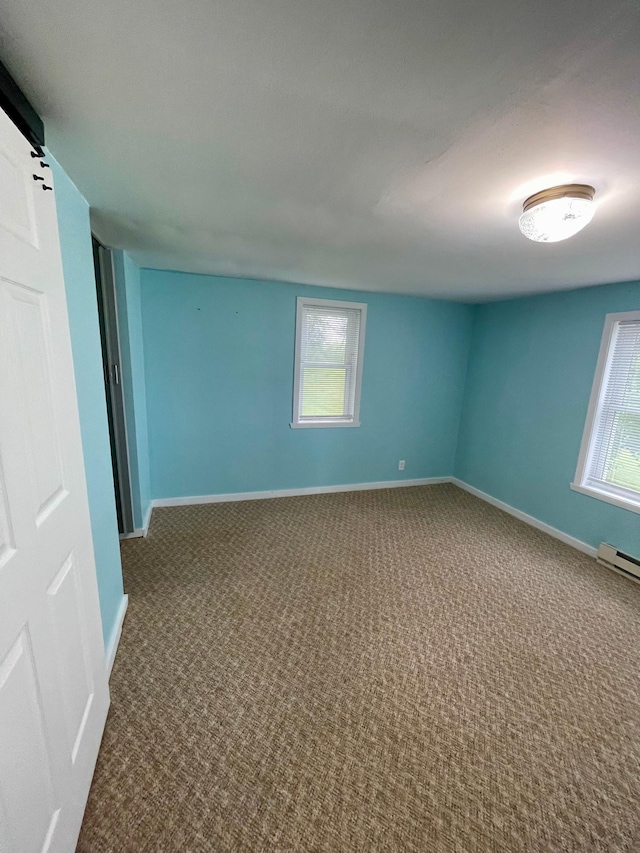 10244 State Highway 87, Blueberry Twp, MN 56464 - empty room featuring carpet and baseboards