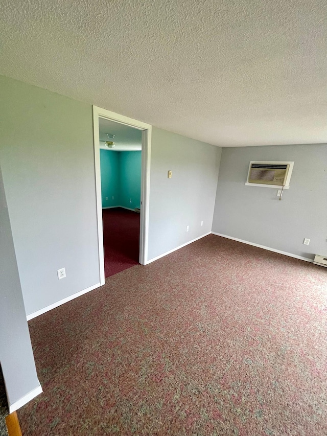 10244 State Highway 87, Blueberry Twp, MN 56464 - carpeted spare room with a wall mounted AC and a textured ceiling