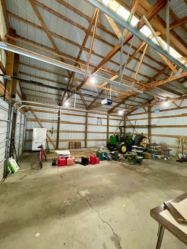 10244 State Highway 87, Blueberry Twp, MN 56464 - garage with a garage door opener and metal wall