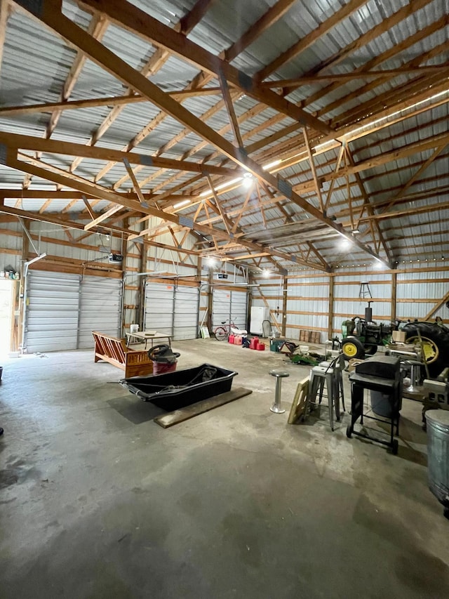 10244 State Highway 87, Blueberry Twp, MN 56464 - garage with metal wall and a garage door opener