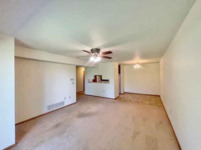 401 County Road 5 Unit 102, Springfield, MN 56087 - unfurnished room with a ceiling fan, carpet floors, and a textured ceiling