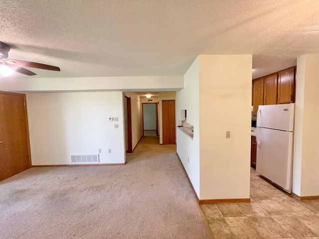 401 County Road 5 Unit 102, Springfield, MN 56087 - spare room featuring a ceiling fan and a textured ceiling