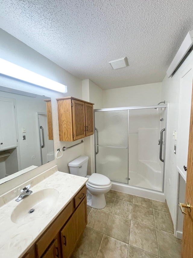 401 County Road 5 Unit 102, Springfield, MN 56087 - bathroom with vanity, a textured ceiling, a shower stall, and tile patterned flooring