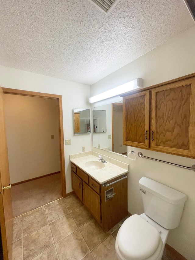 401 County Road 5 Unit 102, Springfield, MN 56087 - bathroom featuring vanity, a textured ceiling, and tile patterned floors
