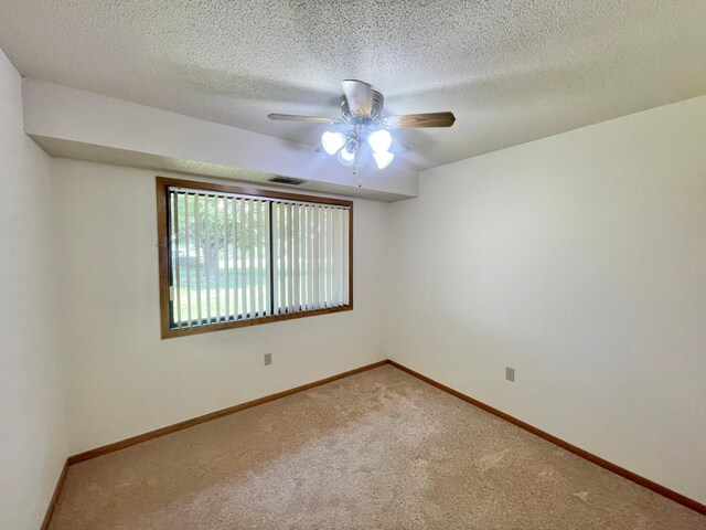 401 County Road 5 Unit 102, Springfield, MN 56087 - carpeted spare room with ceiling fan and a textured ceiling