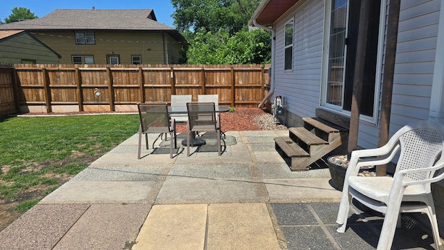 524 1st Ave SE, Wells, MN 56097 - view of patio with outdoor dining space and entry steps