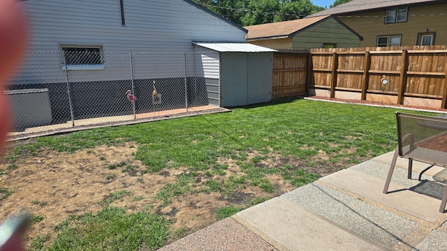 524 1st Ave SE, Wells, MN 56097 - fenced backyard featuring a storage unit