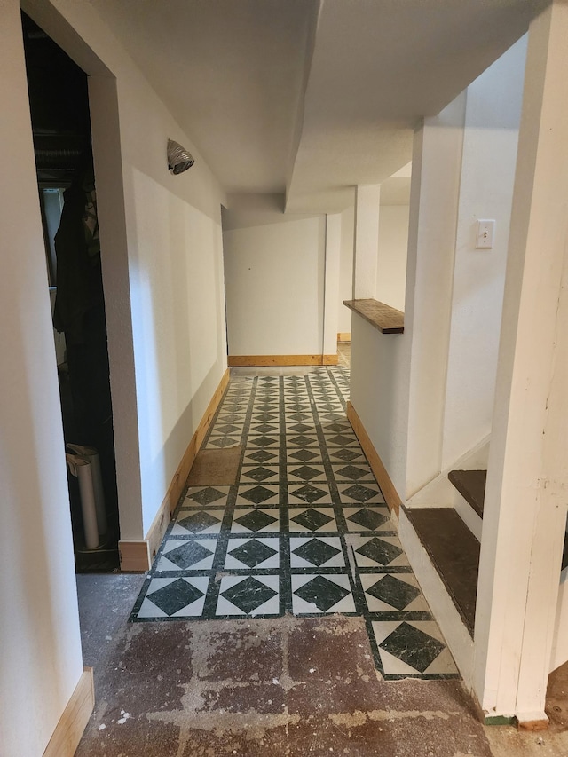 524 1st Ave SE, Wells, MN 56097 - hallway with tile patterned floors and stairway