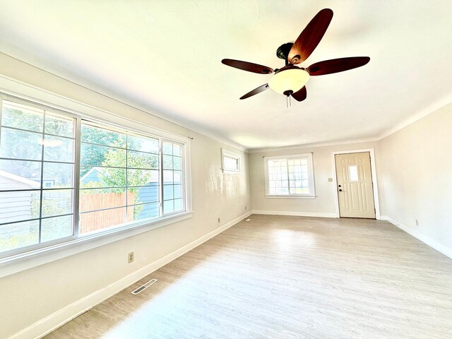 2112 Manitou Ave, Saint Paul, MN 55119 - unfurnished room with light wood-type flooring and ceiling fan
