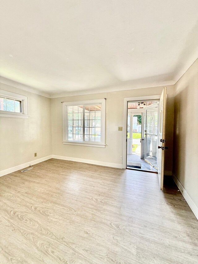 2112 Manitou Ave, Saint Paul, MN 55119 - unfurnished room with light wood finished floors and baseboards