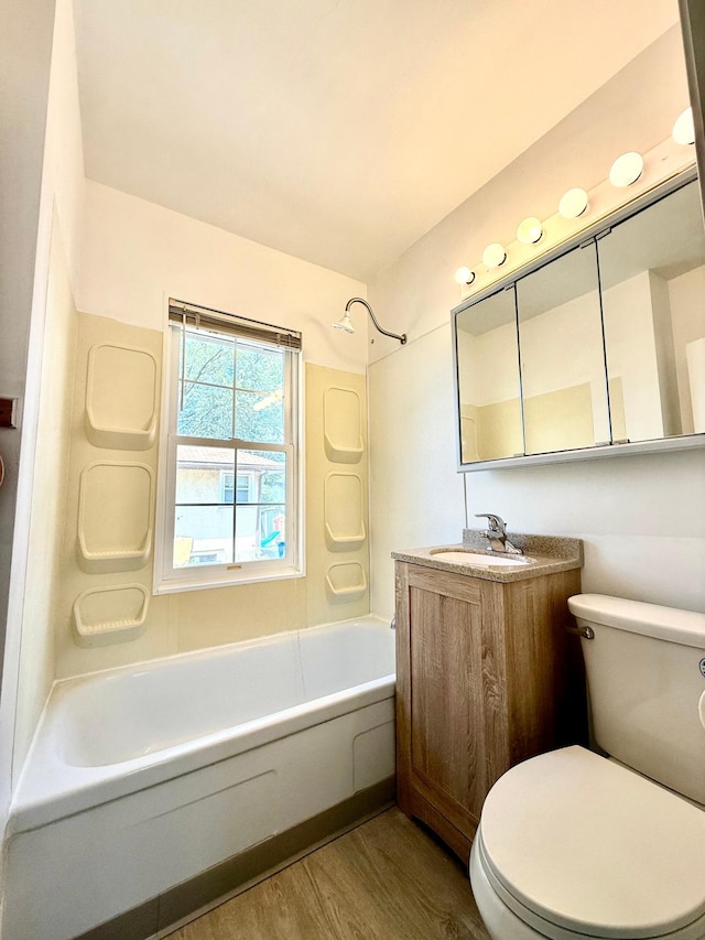 2112 Manitou Ave, Saint Paul, MN 55119 - full bathroom featuring wood finished floors, washtub / shower combination, and vanity