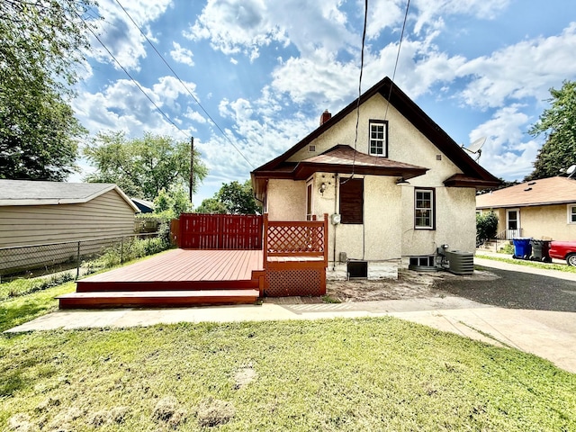 2112 Manitou Ave, Saint Paul, MN 55119 - back of house with stucco siding and a wooden deck