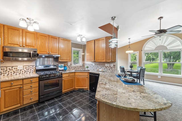 6636 Lancaster Ln N, Maple Grove, MN 55369 - kitchen with stainless steel appliances, a peninsula, under cabinet range hood, light stone counters, and tasteful backsplash