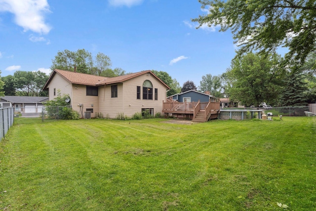 6636 Lancaster Ln N, Maple Grove, MN 55369 - rear view of property with a fenced backyard and a deck