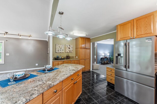 6636 Lancaster Ln N, Maple Grove, MN 55369 - kitchen with stainless steel fridge, light stone counters, dark tile patterned floors, and crown molding