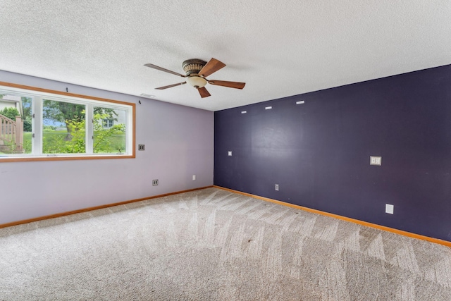 6636 Lancaster Ln N, Maple Grove, MN 55369 - carpeted spare room with a ceiling fan and a textured ceiling