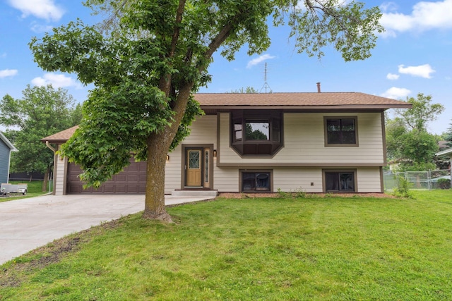 6636 Lancaster Ln N, Maple Grove, MN 55369 - split foyer home featuring driveway and roof with shingles