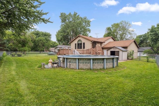 6636 Lancaster Ln N, Maple Grove, MN 55369 - rear view of house with a shed, a fenced backyard, and a deck