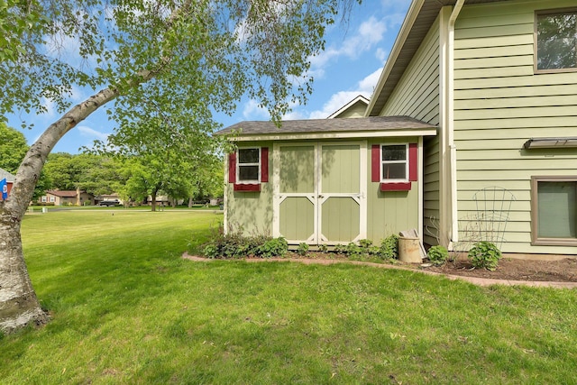 1805 7th Ave N, Sartell, MN 56377 - view of green lawn with a shed