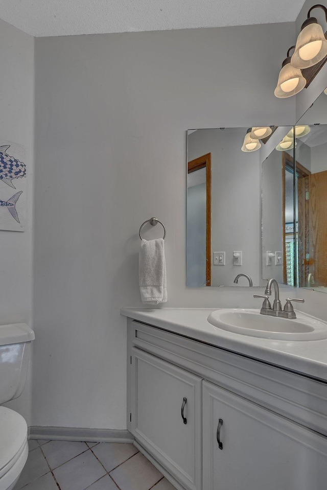 1805 7th Ave N, Sartell, MN 56377 - half bath featuring vanity and tile patterned floors