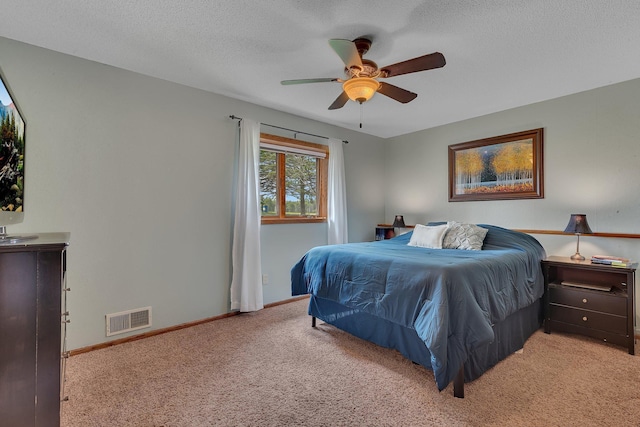 1805 7th Ave N, Sartell, MN 56377 - carpeted bedroom featuring a ceiling fan and a textured ceiling