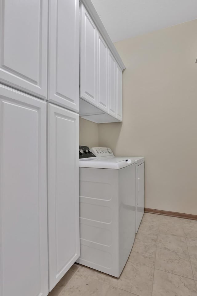 17417 72nd Ave N Unit 205, Maple Grove, MN 55311 - laundry area with washing machine and dryer and cabinet space