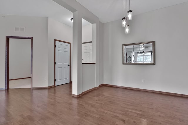 17417 72nd Ave N Unit 205, Maple Grove, MN 55311 - spare room featuring wood finished floors and baseboards