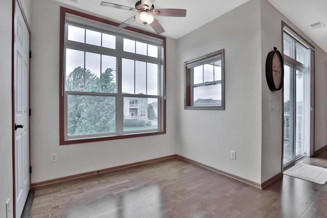 17417 72nd Ave N Unit 205, Maple Grove, MN 55311 - entryway featuring plenty of natural light, ceiling fan, and wood finished floors