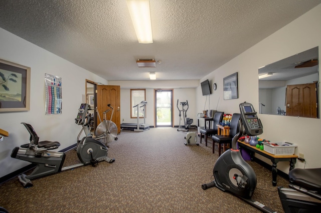 1415 Lake St Unit 114, Alexandria, MN 56308 - workout area featuring a textured ceiling
