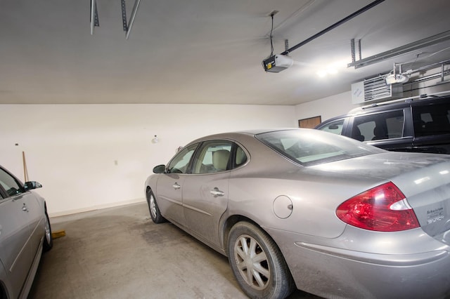 1415 Lake St Unit 114, Alexandria, MN 56308 - garage featuring a garage door opener