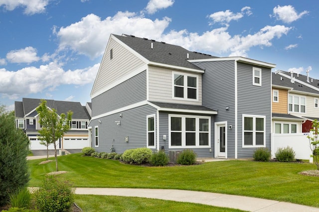732 Wildflower Ln, Chanhassen, MN 55317 - rear view of house with roof with shingles