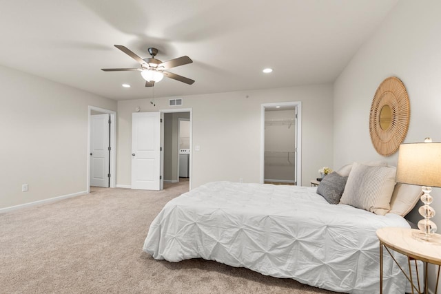 732 Wildflower Ln, Chanhassen, MN 55317 - bedroom featuring light carpet, recessed lighting, a spacious closet, a ceiling fan, and a closet