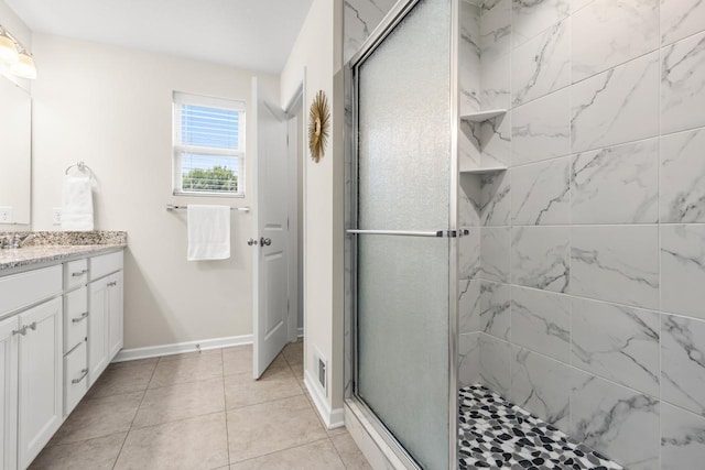 732 Wildflower Ln, Chanhassen, MN 55317 - full bath with vanity, a shower stall, and tile patterned flooring