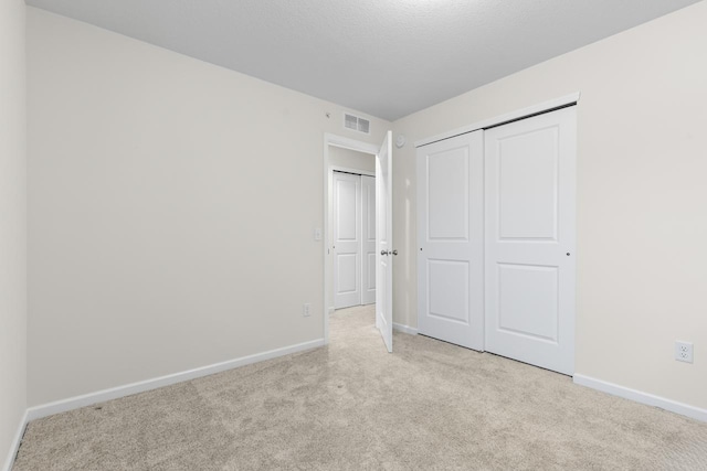 732 Wildflower Ln, Chanhassen, MN 55317 - unfurnished bedroom featuring carpet and a closet