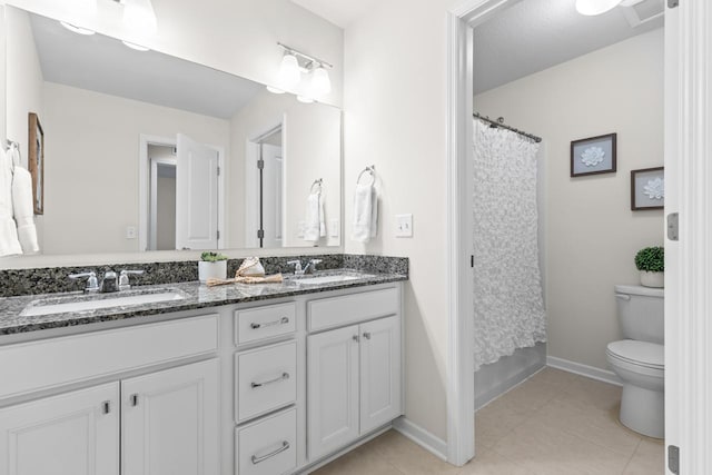 732 Wildflower Ln, Chanhassen, MN 55317 - bathroom with double vanity, tile patterned floors, and a shower with curtain