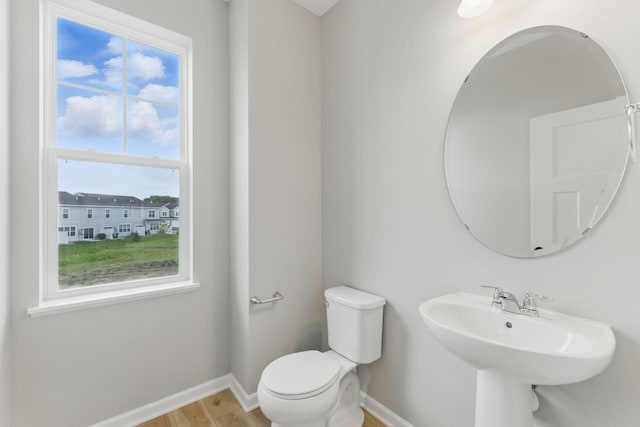 2720 Kepler Ave NE, Saint Michael, MN 55376 - bathroom with baseboards and wood finished floors