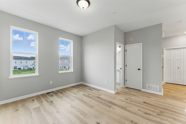 2720 Kepler Ave NE, Saint Michael, MN 55376 - unfurnished bedroom featuring light wood-style flooring