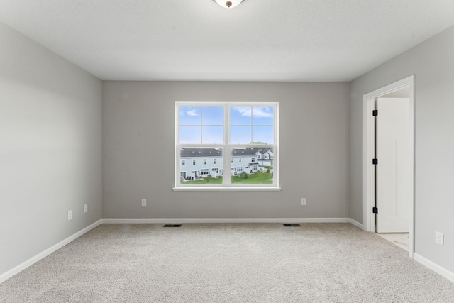 2720 Kepler Ave NE, Saint Michael, MN 55376 - unfurnished room featuring light carpet and baseboards
