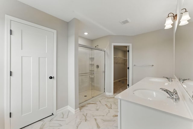 2720 Kepler Ave NE, Saint Michael, MN 55376 - full bathroom with a stall shower, a spacious closet, recessed lighting, marble look tile flooring, and double vanity