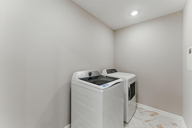2720 Kepler Ave NE, Saint Michael, MN 55376 - laundry area with washing machine and dryer, light marble finish flooring, and recessed lighting