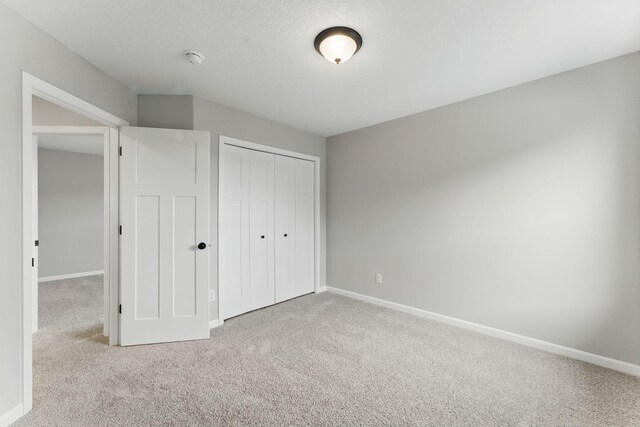 2720 Kepler Ave NE, Saint Michael, MN 55376 - unfurnished bedroom featuring carpet floors and a closet