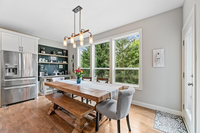 19550 Albany Cir NW, Elk River, MN 55330 - dining space featuring light wood-style floors