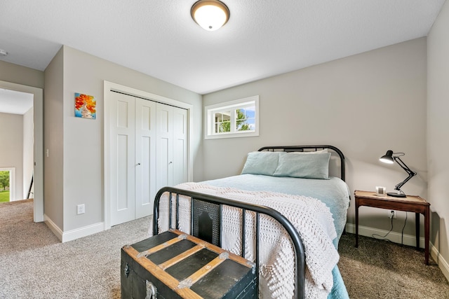 19550 Albany Cir NW, Elk River, MN 55330 - carpeted bedroom featuring baseboards and a closet
