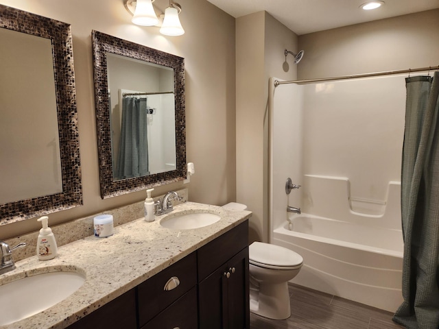 19550 Albany Cir NW, Elk River, MN 55330 - bathroom with shower / tub combo, double vanity, wood finished floors, and recessed lighting