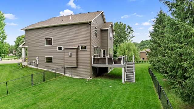 19550 Albany Cir NW, Elk River, MN 55330 - rear view of house with stairs, a deck, and a fenced backyard